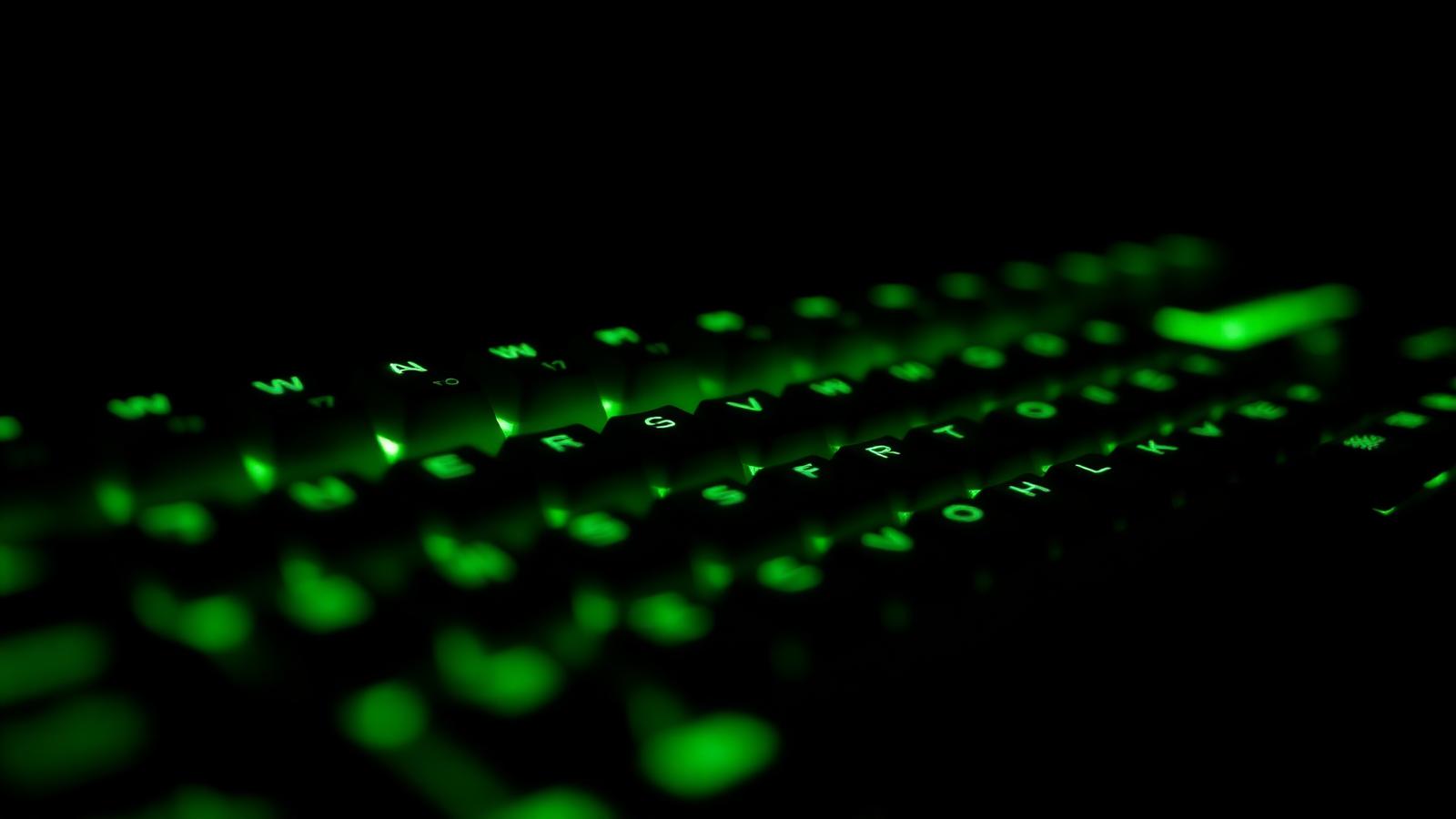 Backlit mechanical gaming keyboard keys in a dark room